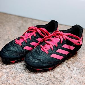 Girls soccer cleats and shin guards